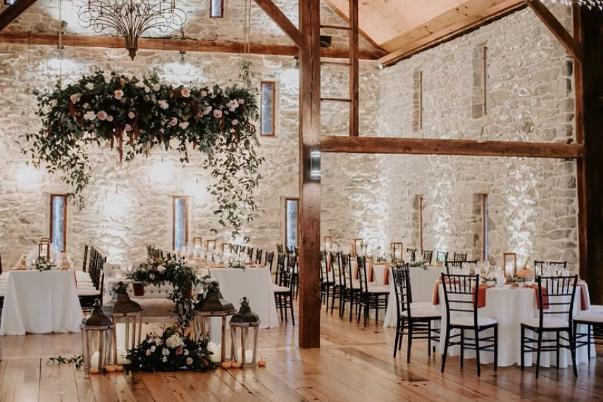 The Barn at Silverstone Wedding Reception Reception setup inside The Barn at Silverstone wedding venue in Lancaster County, Pennsylvania