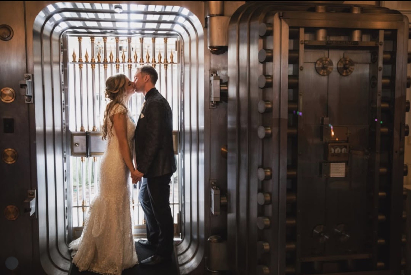 Hotel Gettysburg Wedding Photo Inside Historic Bank Vault Bride and groom kissing inside the historic bank vault at Hotel Gettysburg in Gettysburg, PA.