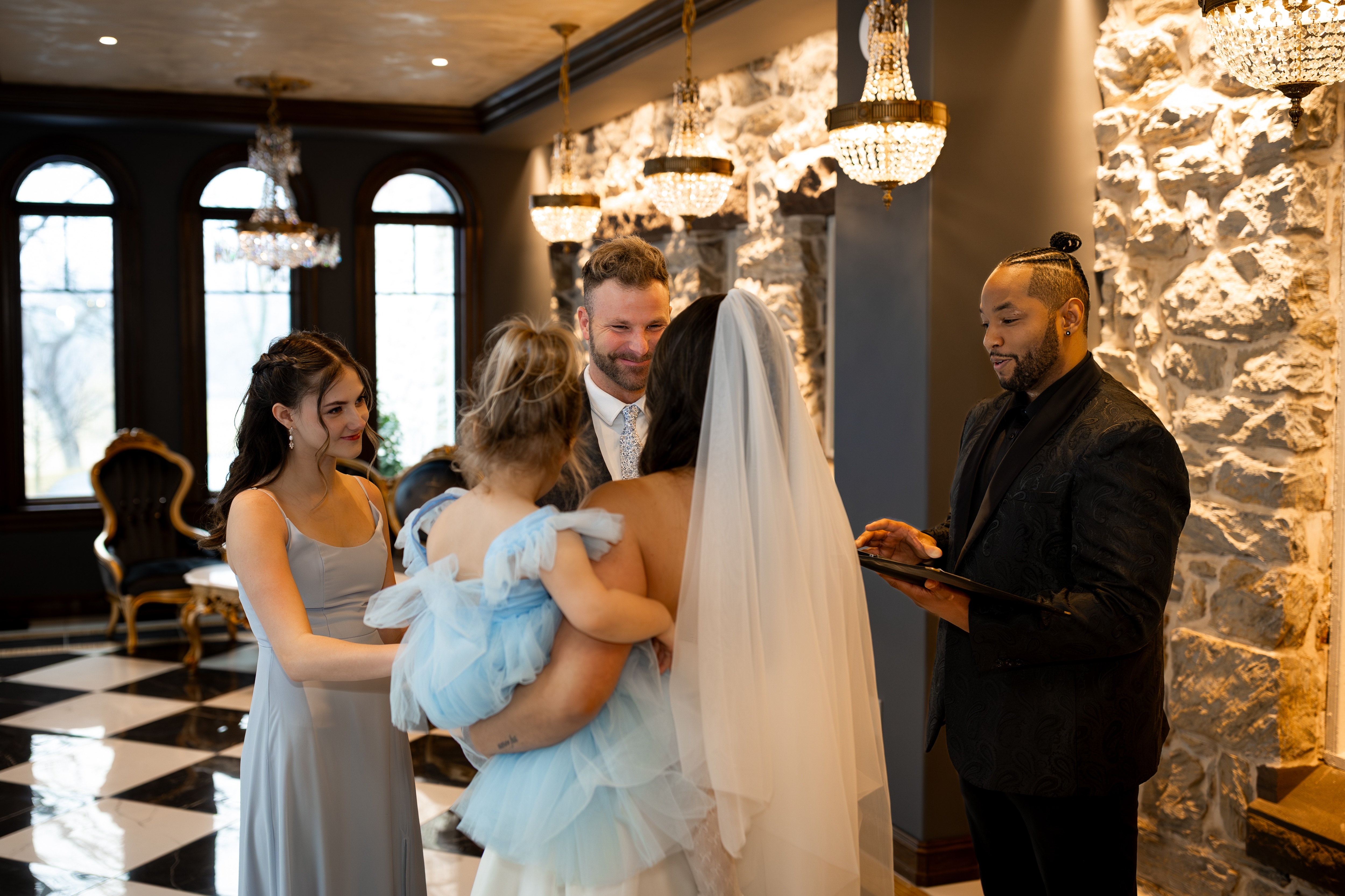 Intimate Family Elopement Ceremony at The Willows at Ashcombe Bride and groom exchange vows with their daughters during an intimate Pennsylvania elopement ceremony officiated by TheBROfficiant at The Willows at Ashcombe.