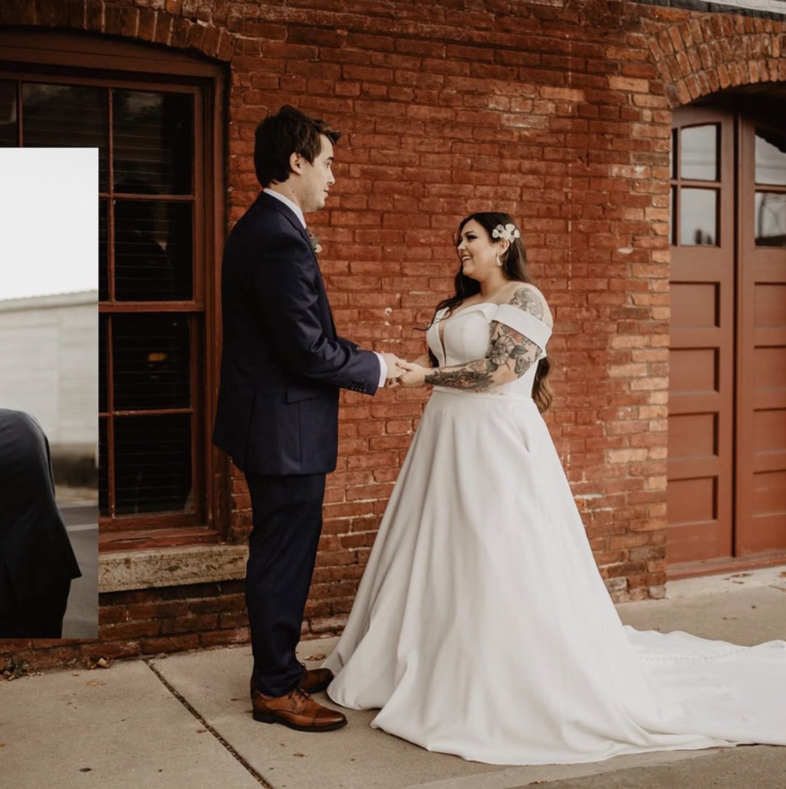 Wedding Portrait at Reology in Lancaster, PA Bride and groom standing together outside a historic red brick building at Reology in Lancaster, PA.