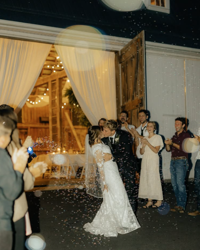 Springside Barn Wedding Exit Newlyweds celebrating outside Springside Barn wedding venue in East Earl, Pennsylvania