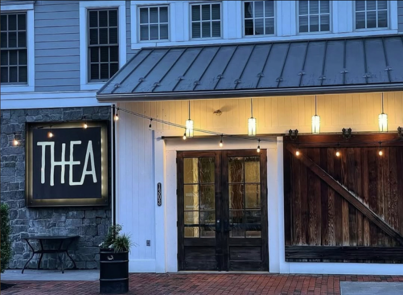 Exterior entrance of THEA in Mechanicsburg, Pennsylvania, a modern restaurant and rehearsal dinner destination near Harrisburg.